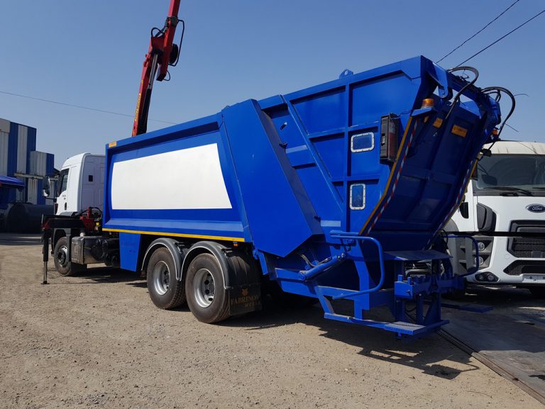 benne tasseuse à colonne aérienne